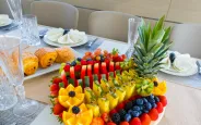 Fruit and bread on the yacht's dining table
