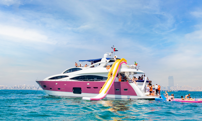 Visitors enjoy yachting trips on customized Dubai yachts.