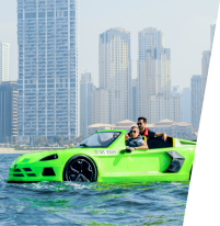 A couple in a green water car stuck in the calm waters of Dubai.