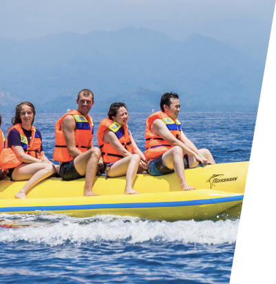 Tourists enjoying a banana boat ride on the Dubai Sea